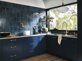 kitchen with blue cabinents