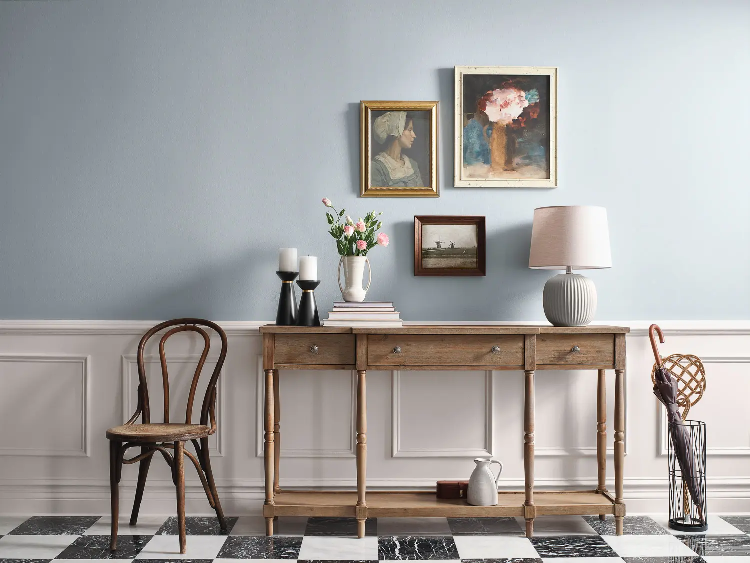 European Country style hallway table with art and a chair