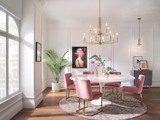 room with pink chairs and table
