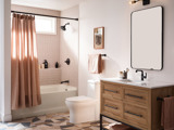 bathroom with pink shower curtain 