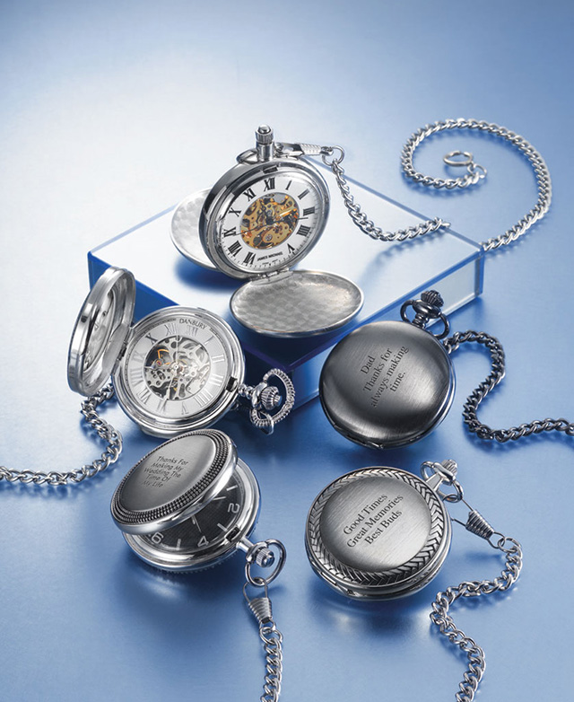 Pocket Watches Over Blue Background