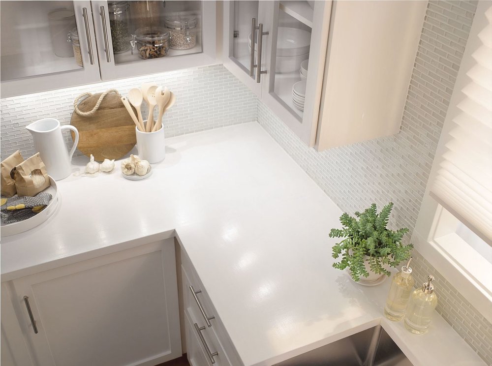 White Kitchen Corner with Lighting and Cabinetry