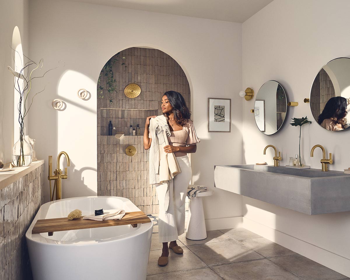 woman walking in bathroom