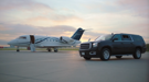 Airplane and car on the runway