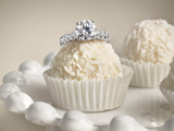 Diamond ring on white cupcakes
