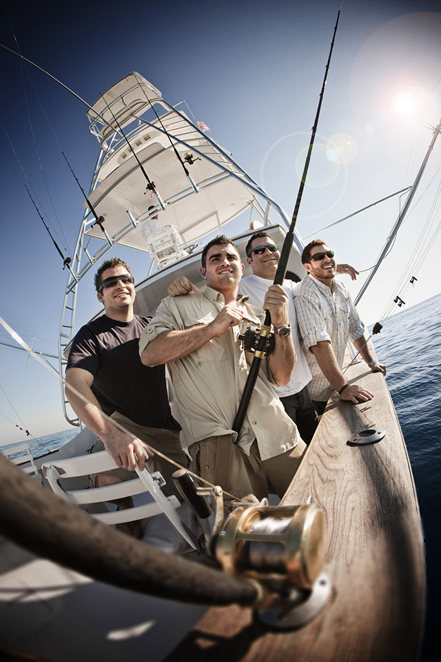 4 People Fishing on a Boat