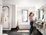 Gold, black and white bathroom