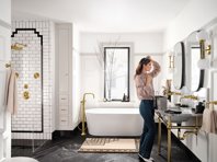 Gold, black and white bathroom