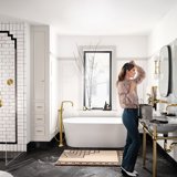 Gold, black and white bathroom