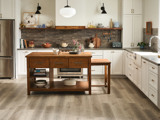kitchen with wood block island in the middle