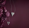 Magenta background with accessories and hearts