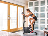 Person On Elliptical Exercise Bike