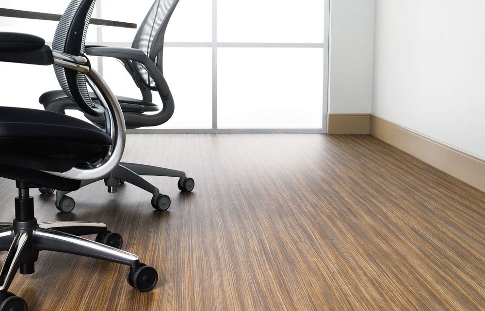 Wood Floor Conference Room with Rolling Chairs
