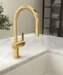 gold CGI faucet