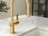 gold CGI faucet