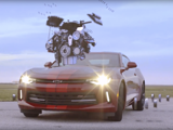 Red car with high tech cameras