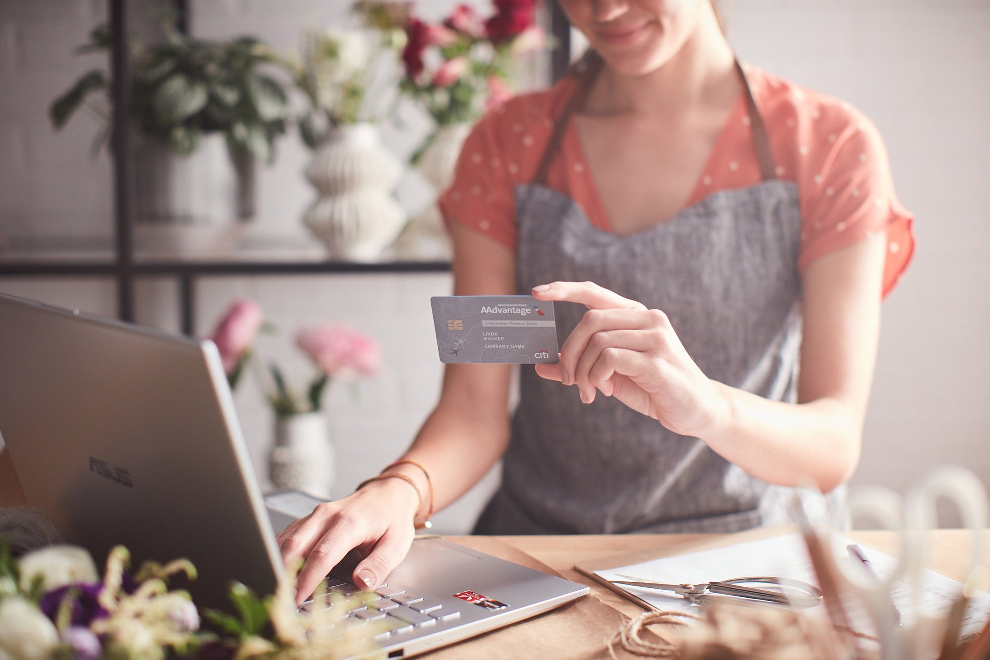 Women entering credit card info 